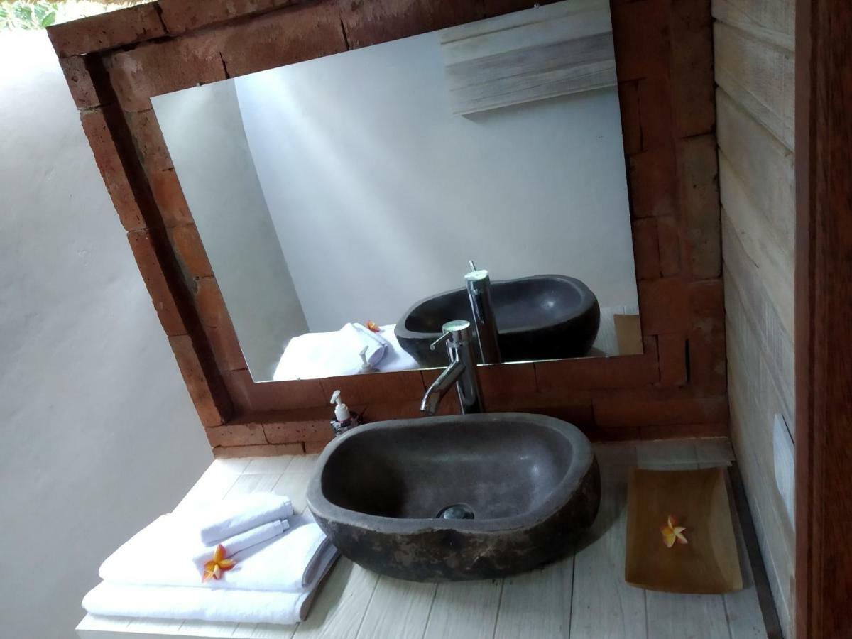 Honeybee Huts Acomodação com café da manhã Lembongan Exterior foto